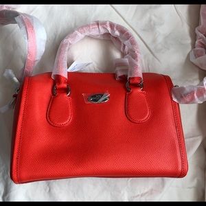 NWT Coach crossbody or carry purse. Bright Orange